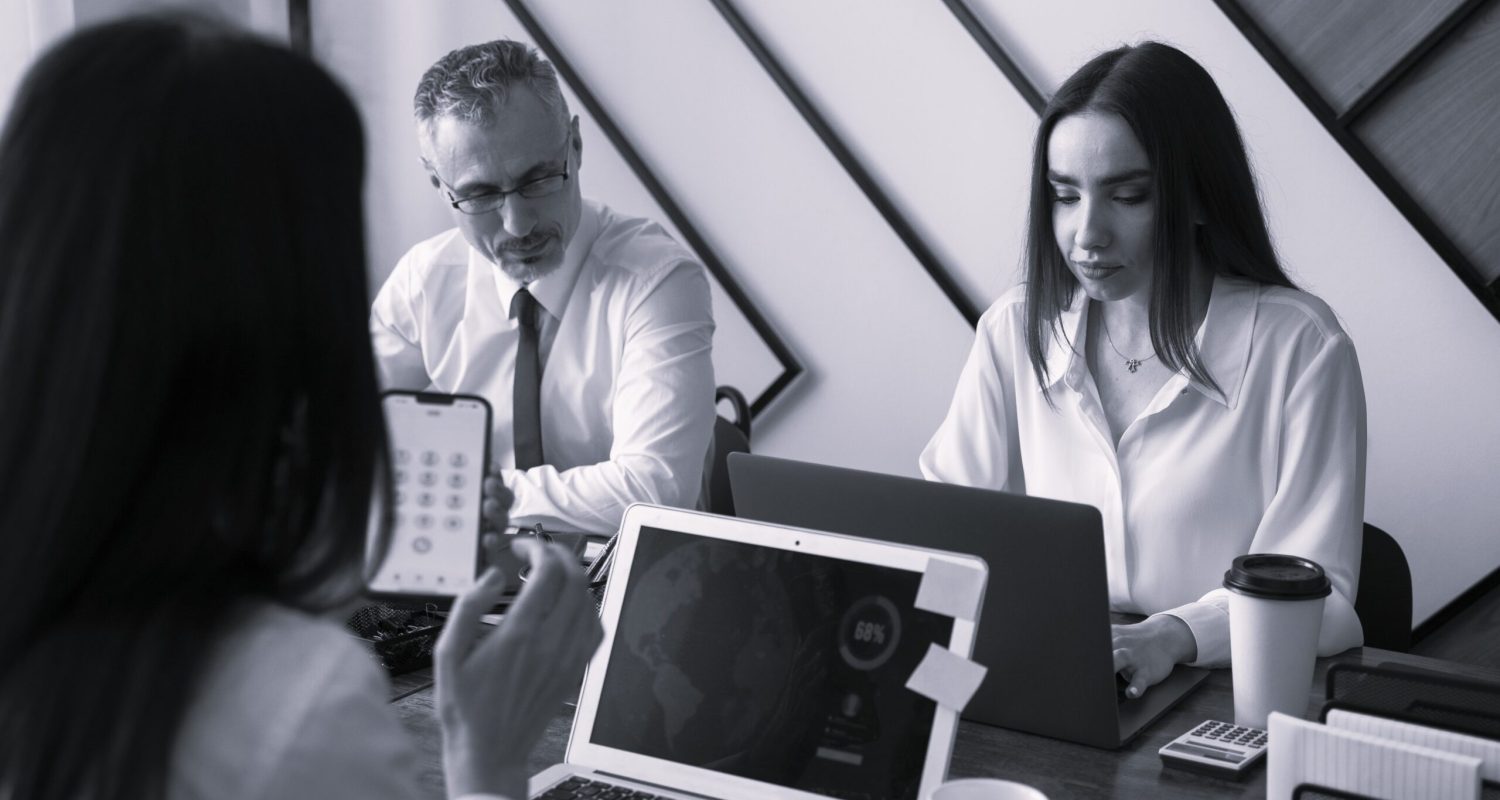 side-view-people-working-with-laptops